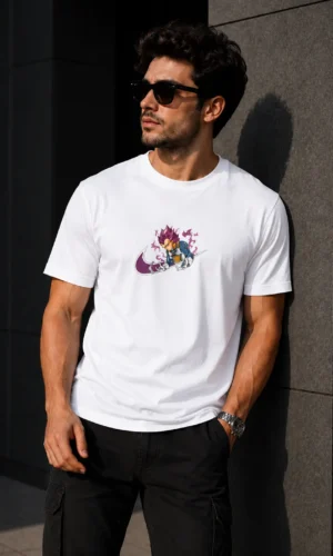 Model wearing a premium cotton T-shirt featuring high-quality embroidered Vegeta artwork inspired by Dragon Ball with detailed textured stitching.