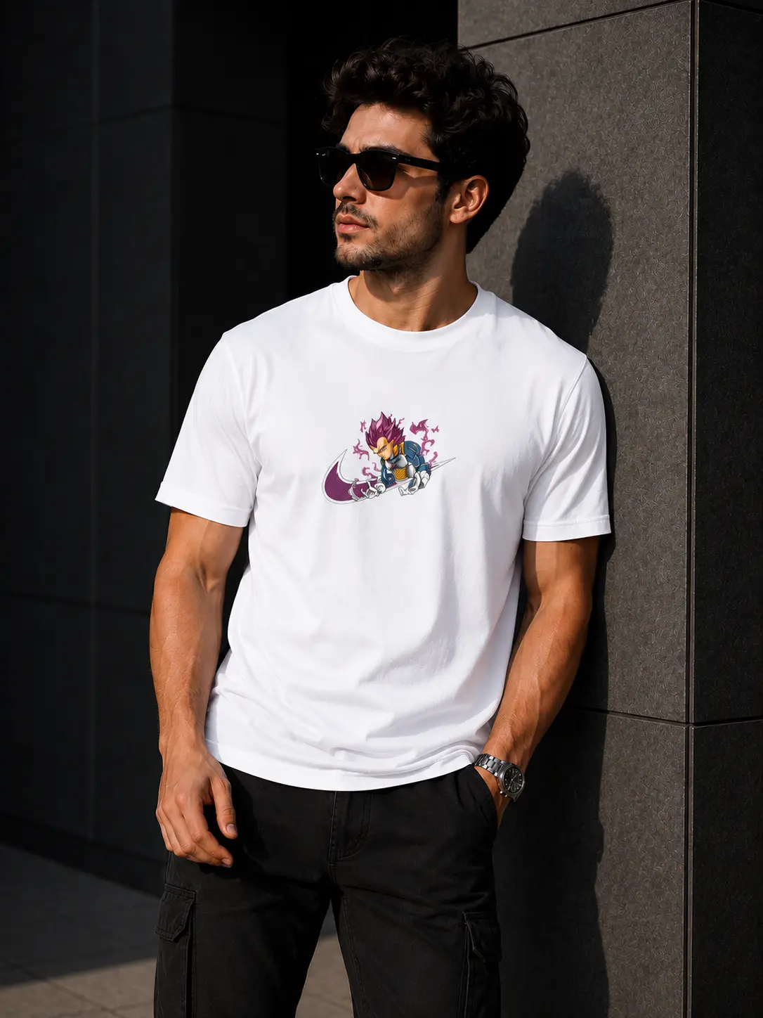 Model wearing a premium cotton T-shirt featuring high-quality embroidered Vegeta artwork inspired by Dragon Ball with detailed textured stitching.